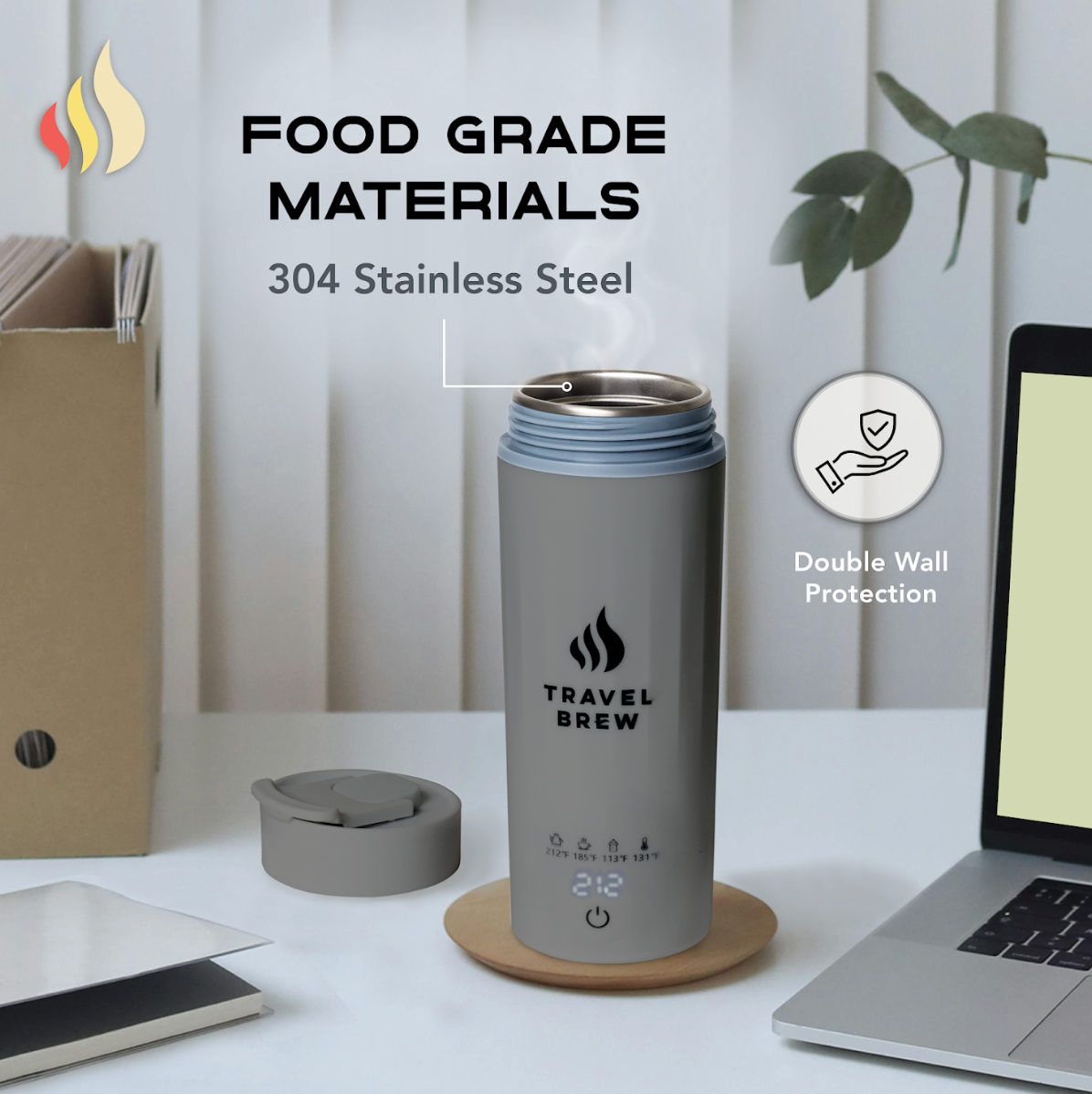 Gray Travel Brew portable electric kettle open with lid on a desk, branding and text about food grade materials.